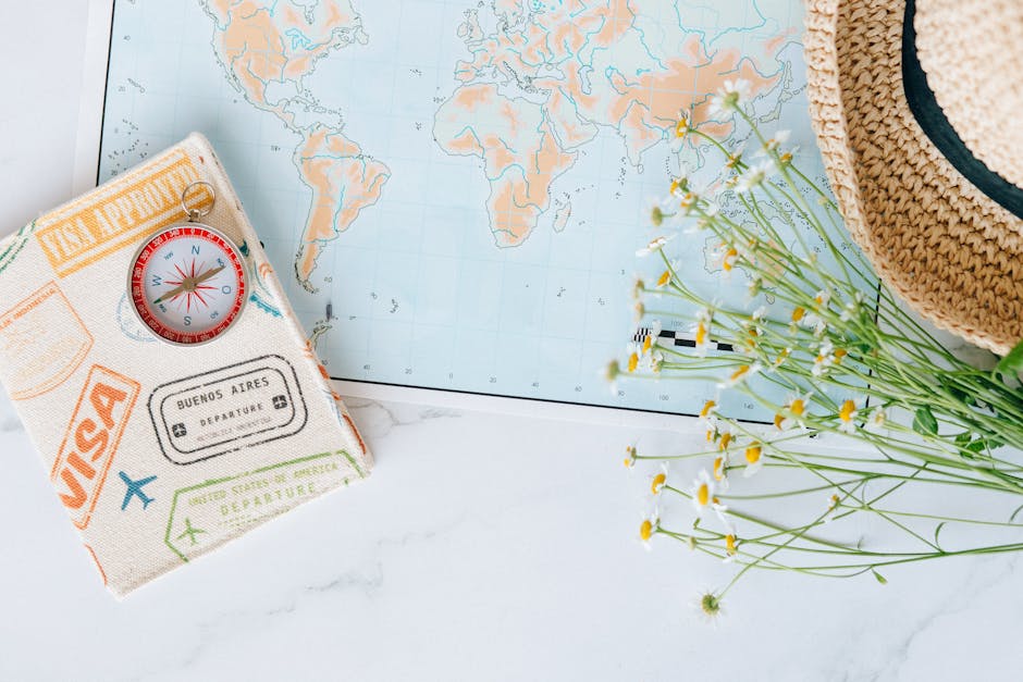 eta england sverige app vs webb – World map compass passport flat lay